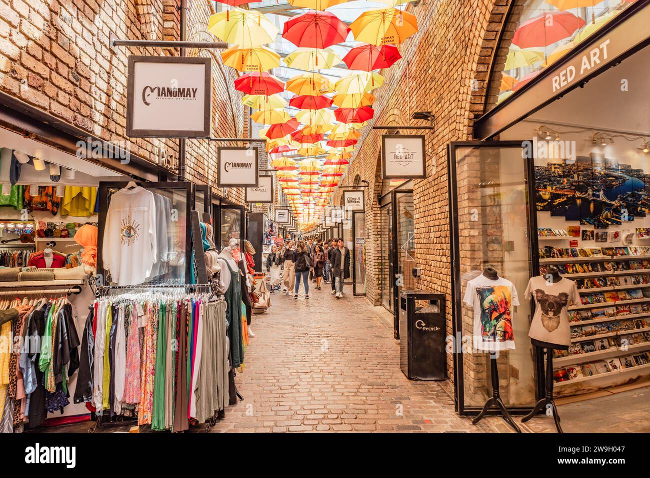 London, UK - May 23, 2023: Beautiful and picturesque street decorated with colored umbrellas in the market of the neighborhood of Camden Town, in Lond Stock Photo