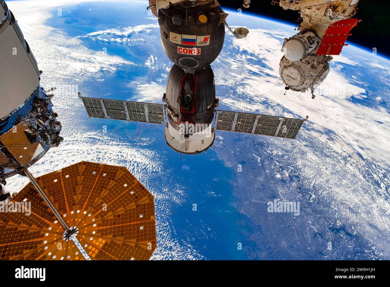 Part of the ISS and planet Earth. Digital enhancement of a NASA image. Stock Photo