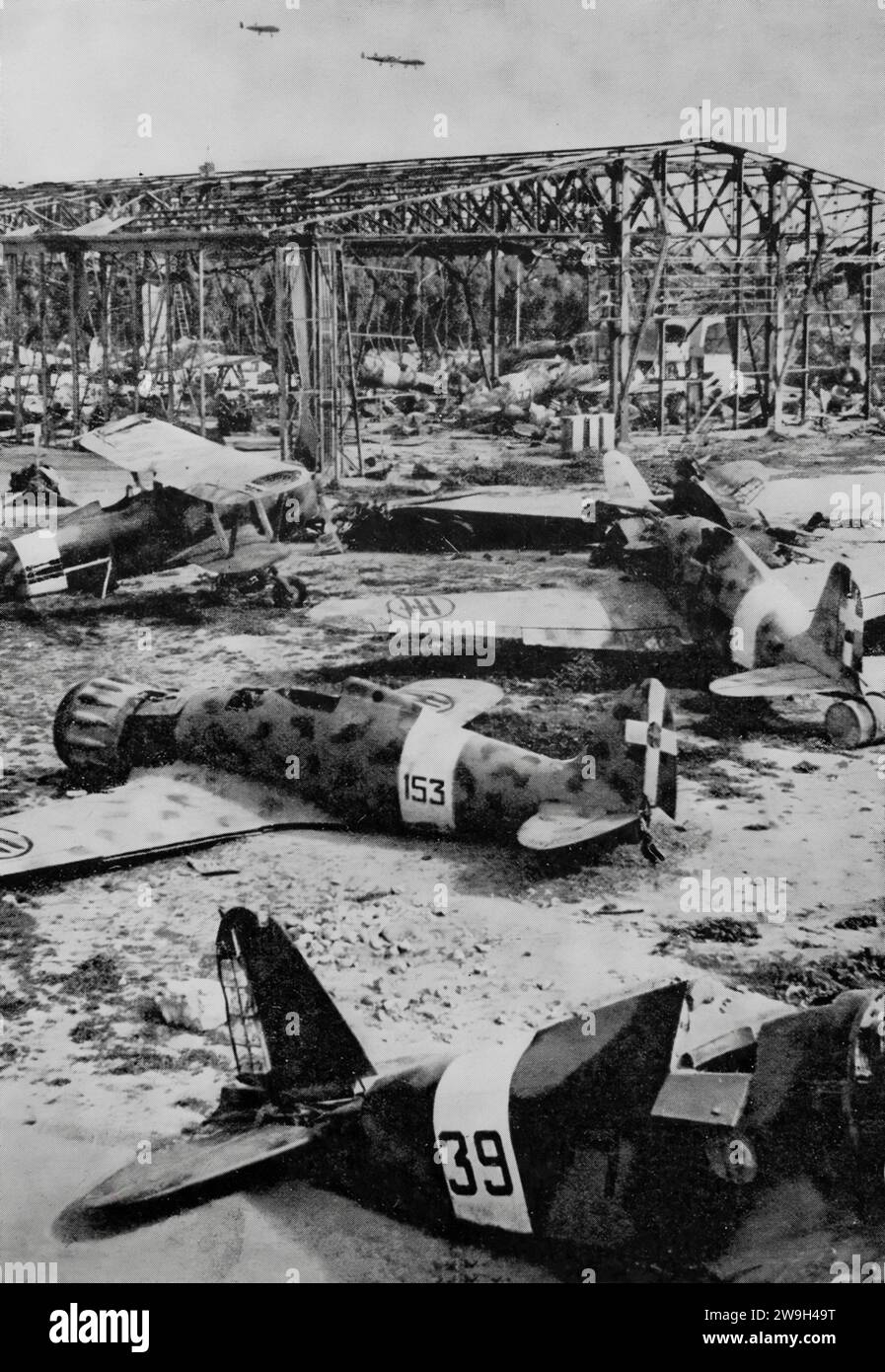 The remains of fighter aircraft at Castel Benito airfield near Tripoli created by the Italians in Italian Libya in the early 1930s. British and American bombers took out the Libyan airfields in December 1942 following the Allied Western Desert Campaign of the Second World War. Stock Photo