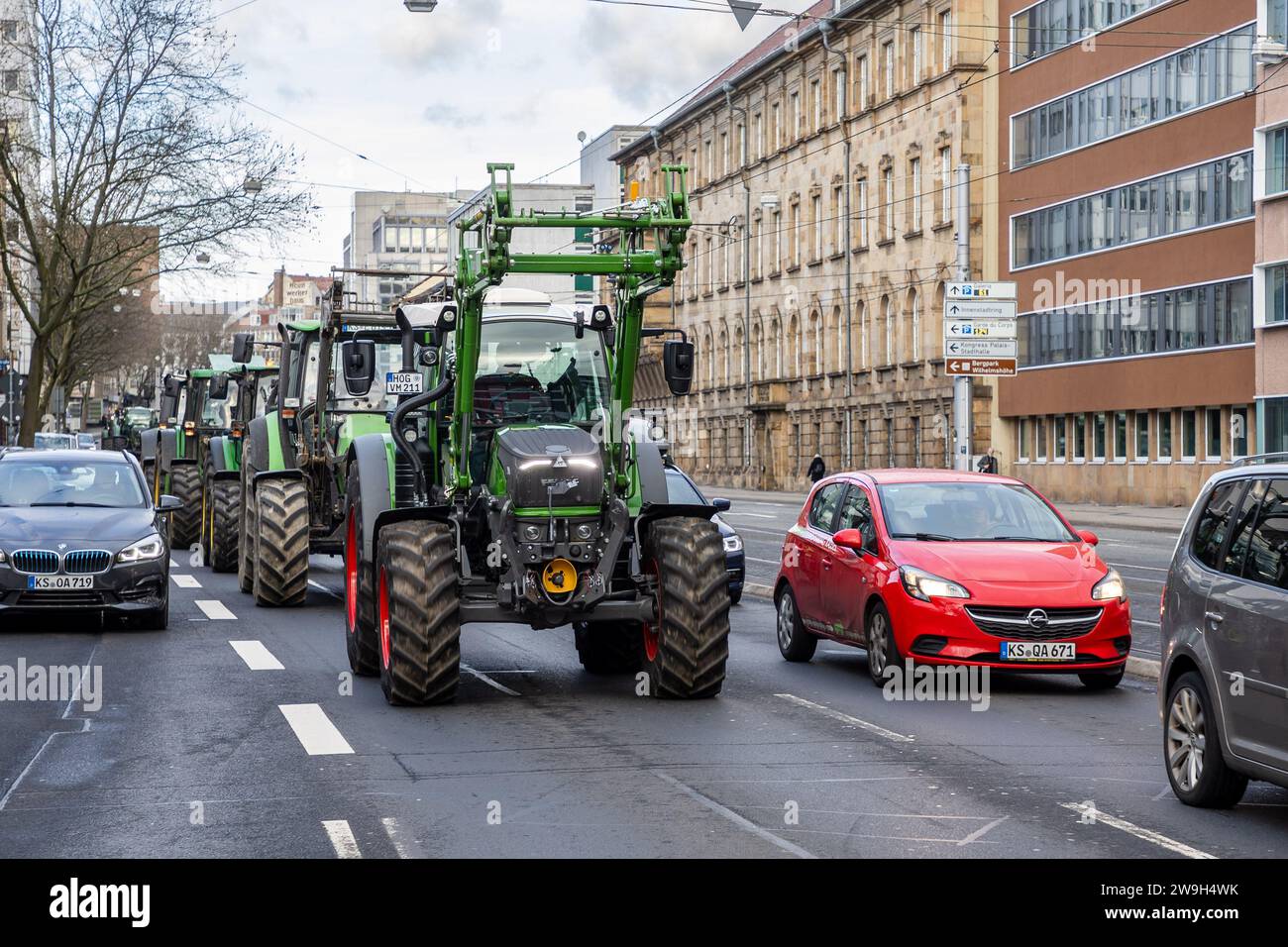 Kassel, Germany, 28. December 2023, Around 100 farmers from northern Hesse demonstrated in Kassel city centre on Thursday (28 December) against the government's plans. After a tractor convoy around the city centre, more than 60 tractors parked in front of the Kassel Regional Council. The farmers then met in front of Kassel's town hall to talk to the public. Farmer Marc Sprenger (49, Staufenberg-Escherode): 'If the traffic light government abolishes the tax-free number plates and the agricultural diesel subsidies, there will be a market distortion in Europe. Families will have to absorb this, t Stock Photo