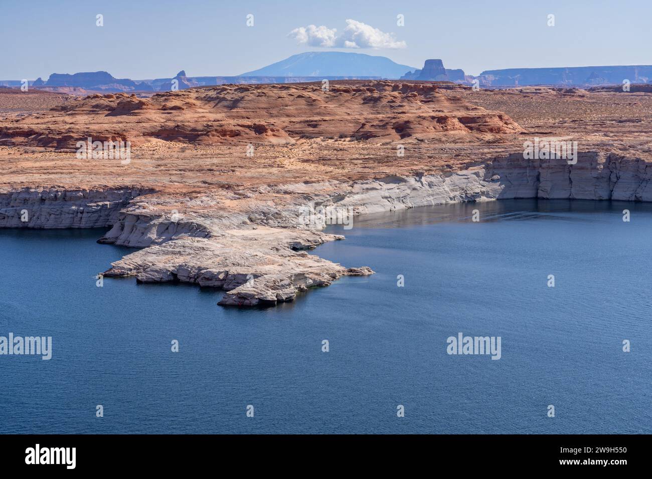 Bleached sandstone shows the former high water mark in Lake Powell ...