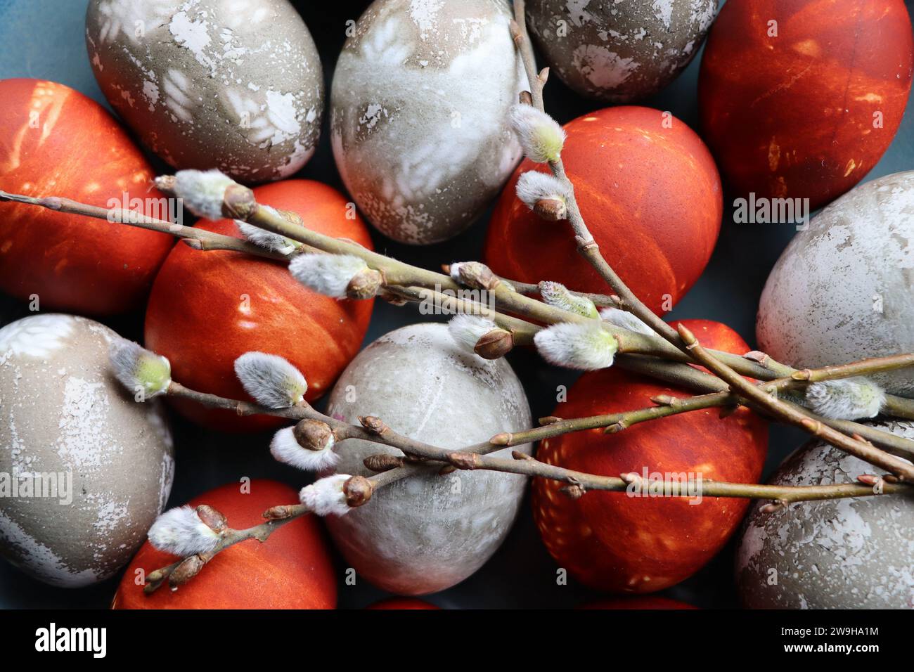 Many decorated Easter eggs as background, top view. Festive tradition Stock Photo
