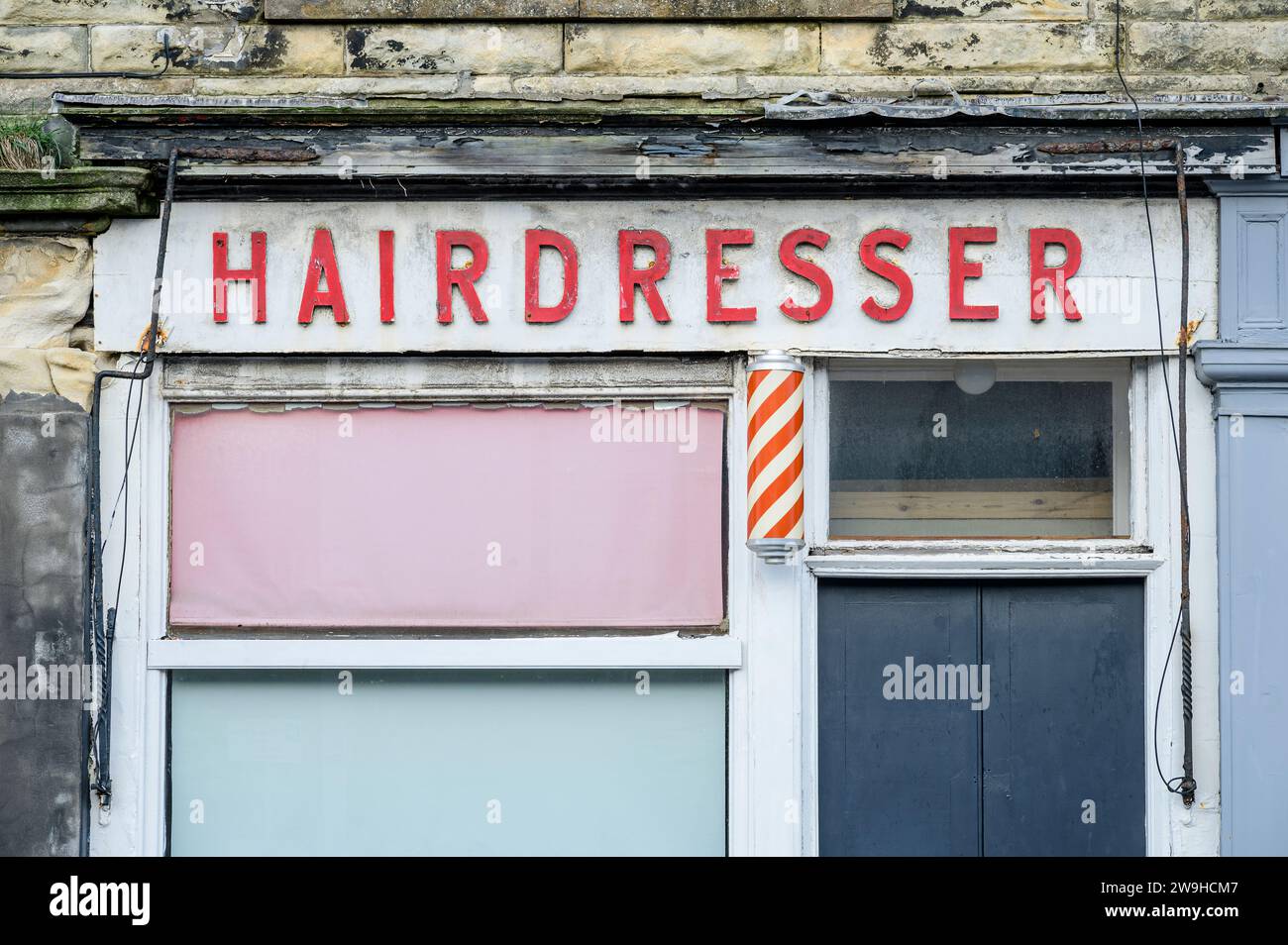 Old hairdresser salon and barber shop Stock Photo