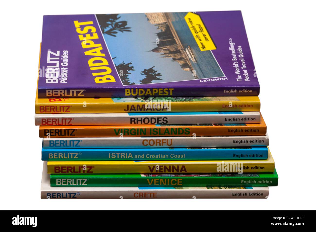 pile of Berlitz Travel Guide books isolated on white background Stock Photo