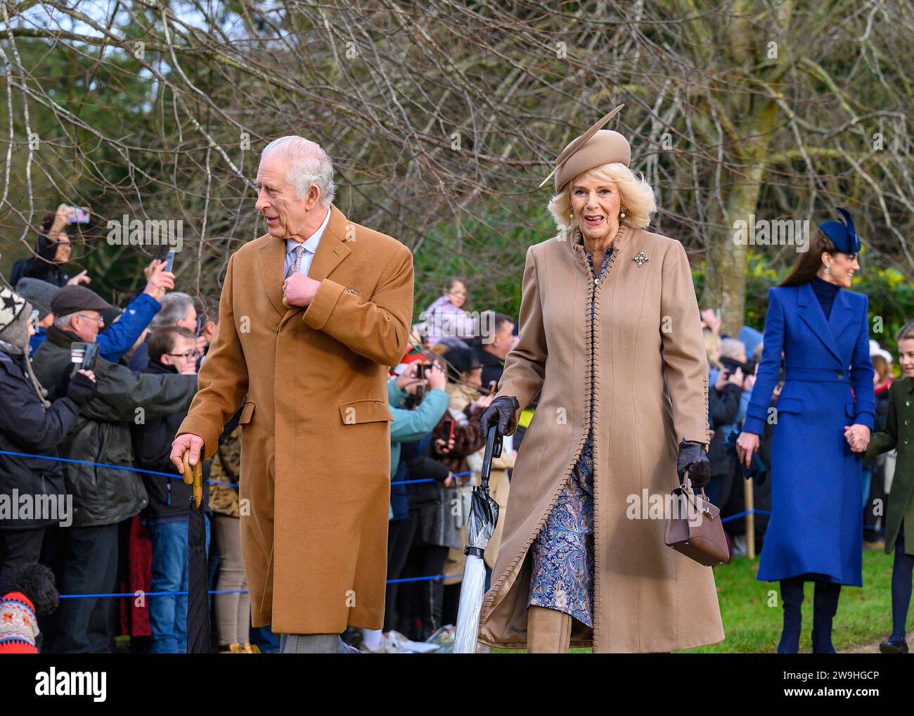 King Charles and Queen Camilla arrive at St Mary Magdalene Church, Sandringham for the Christmas morning service. December 25, 2023 Stock Photo