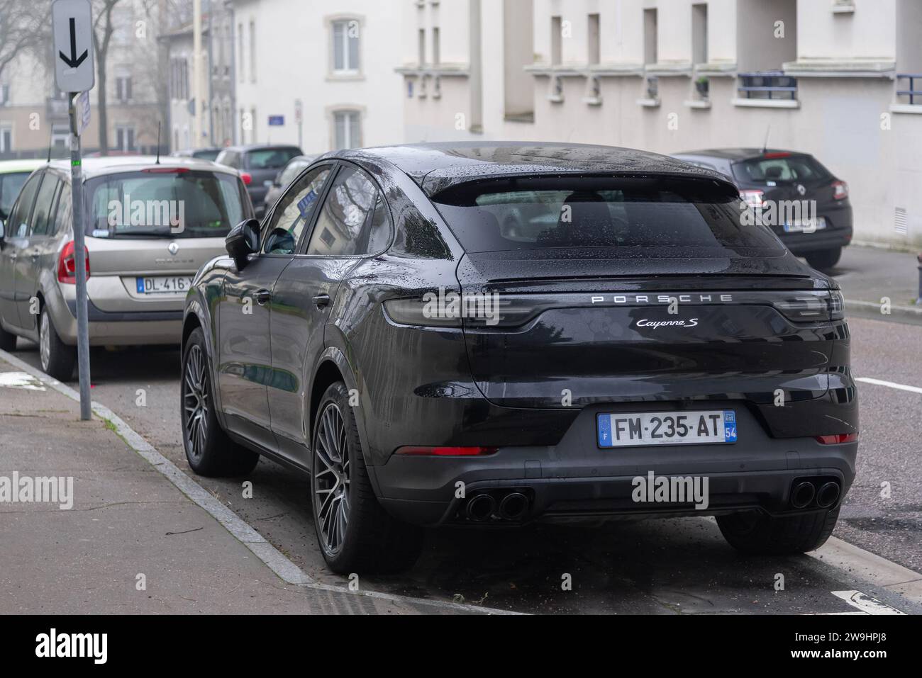 Nancy, France - Black Porsche Cayenne S Coupé parked on the street. Stock Photo