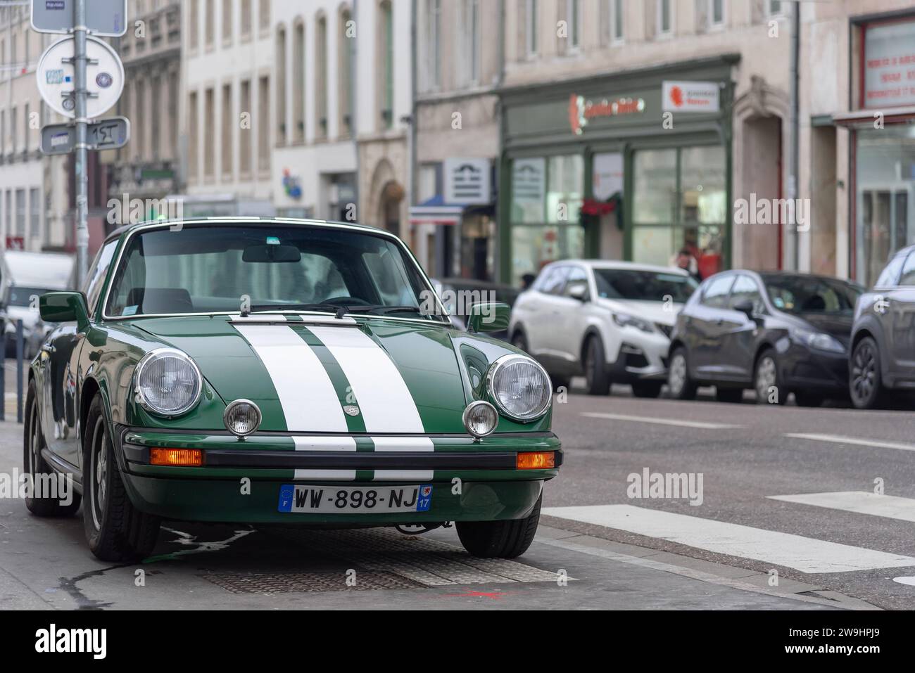 Nancy, France - Green Porsche 911S Targa parked on the street. Stock Photo