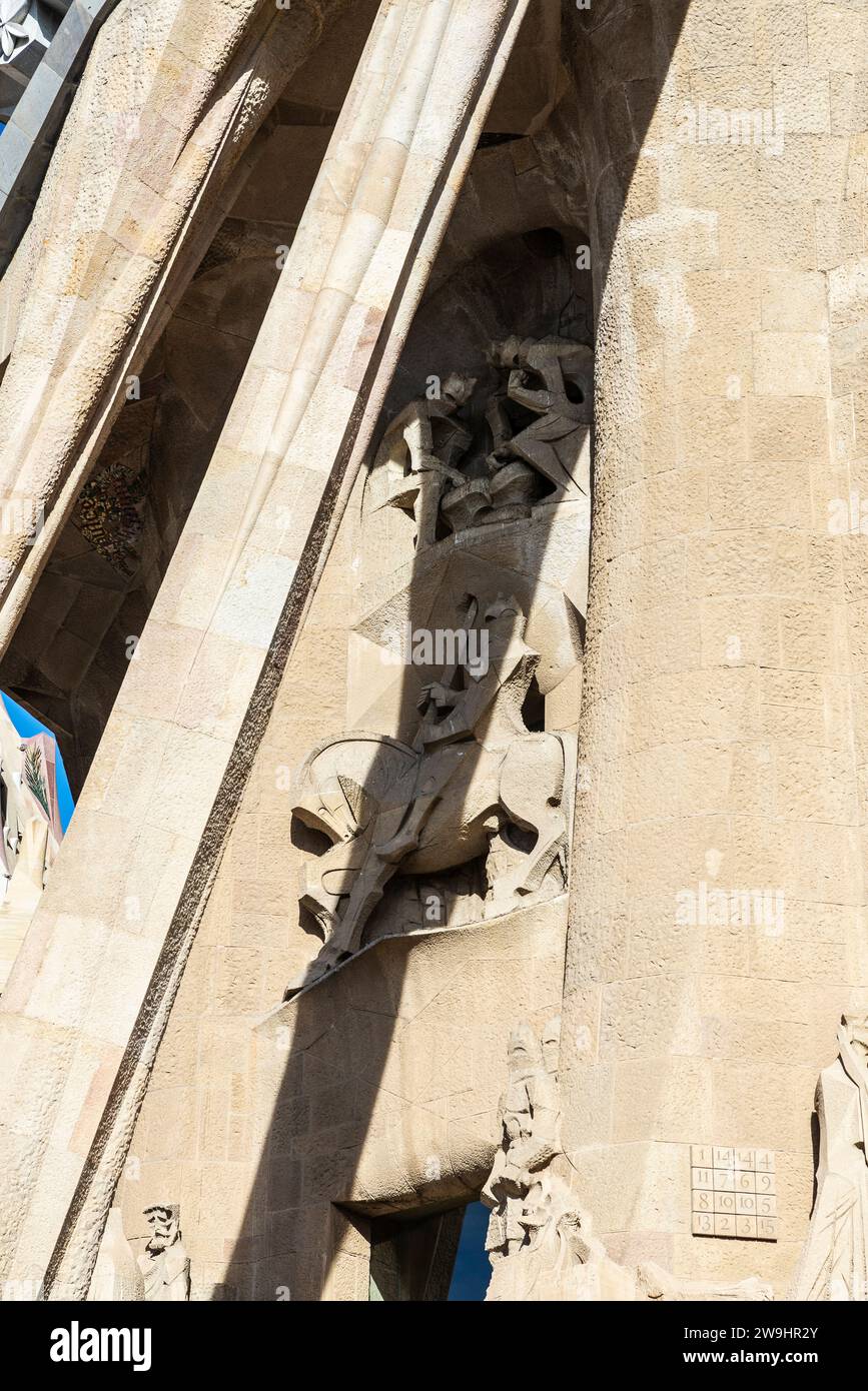 Barcelona, Spain - November 30, 2023: Passion Facade of the Sagrada Familia or Church of the Holy Family, large Roman Catholic church designed by Cata Stock Photo