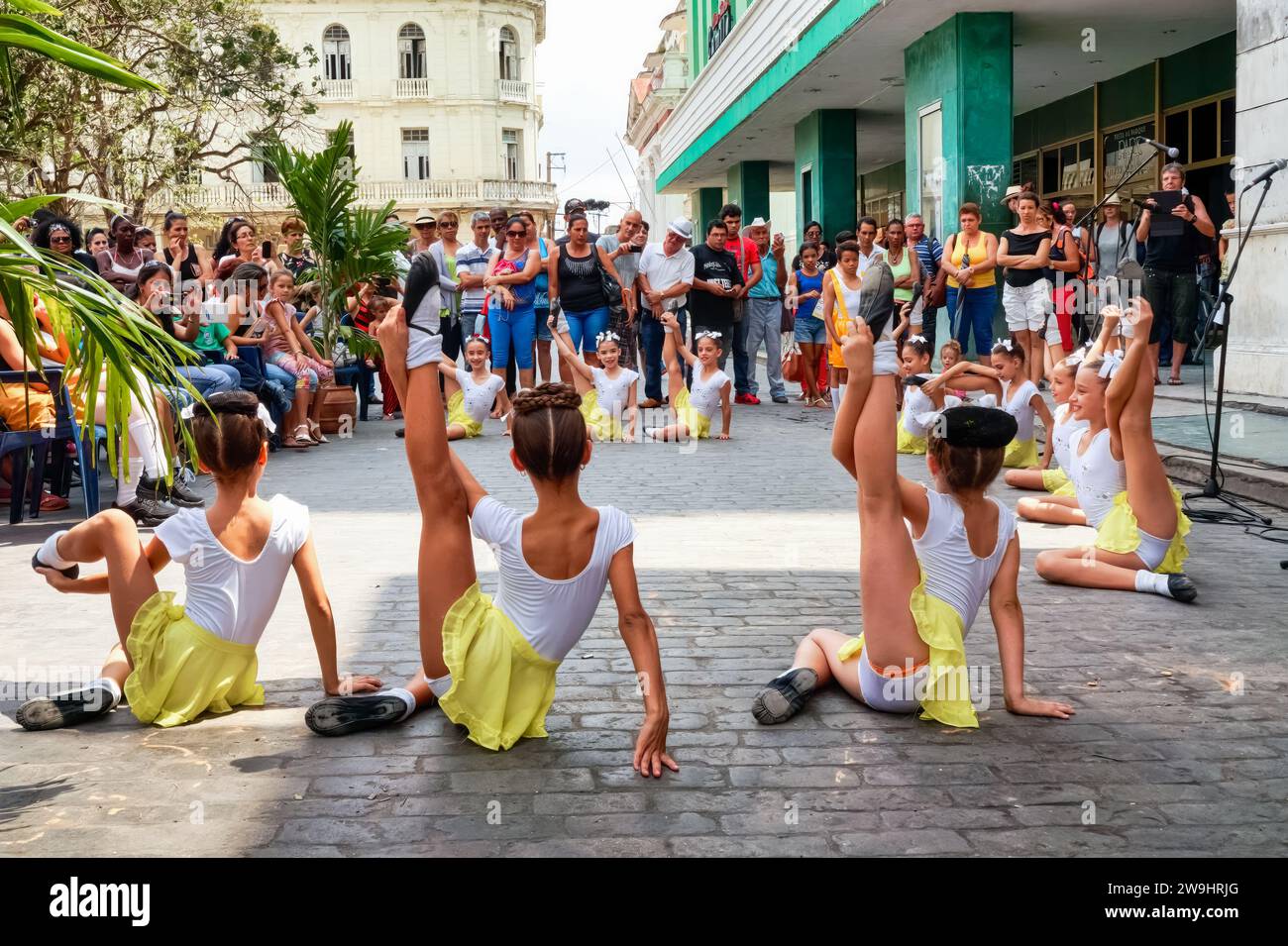 Cuban art students performing a ballet in front of a live audience at the Santa Clara Book Fair. Leoncio Vidal Plaza Stock Photo