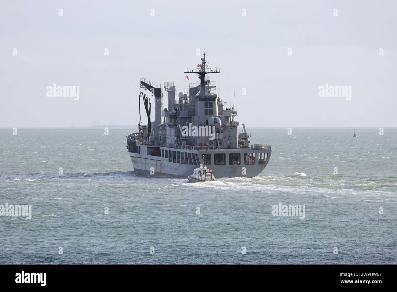 A launch prepares to disembark the Admiralty pilot from the Republic of Korea Navy fast combat support ship ROKS HWACHEON in The Solent Stock Photo