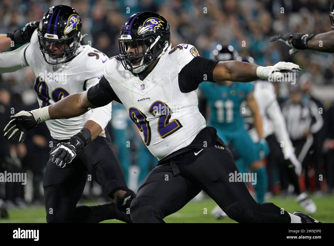 Baltimore Ravens defensive tackle Justin Madubuike (92) follows a play ...