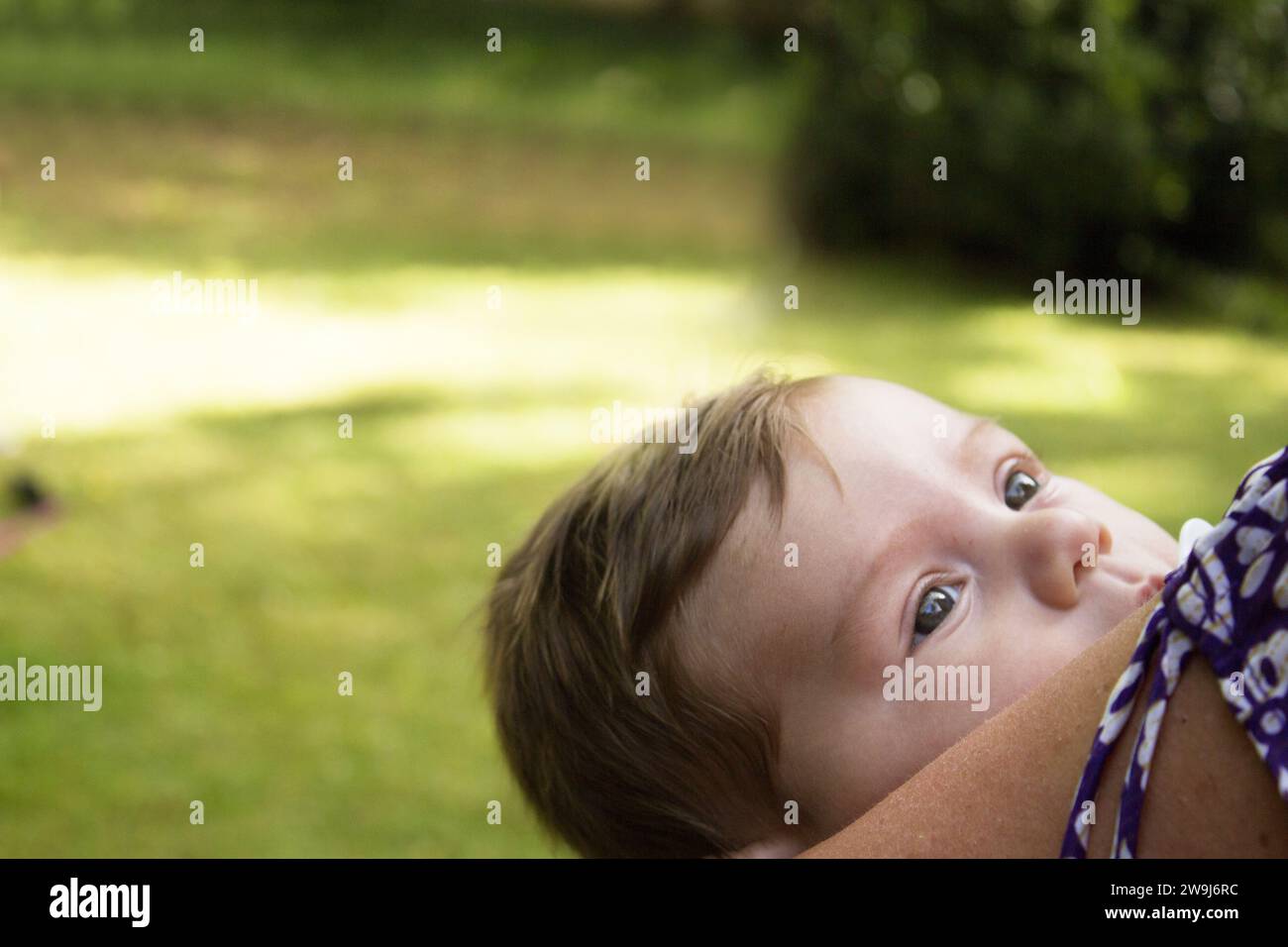 Two month old baby about to start crying. No happy expression Stock