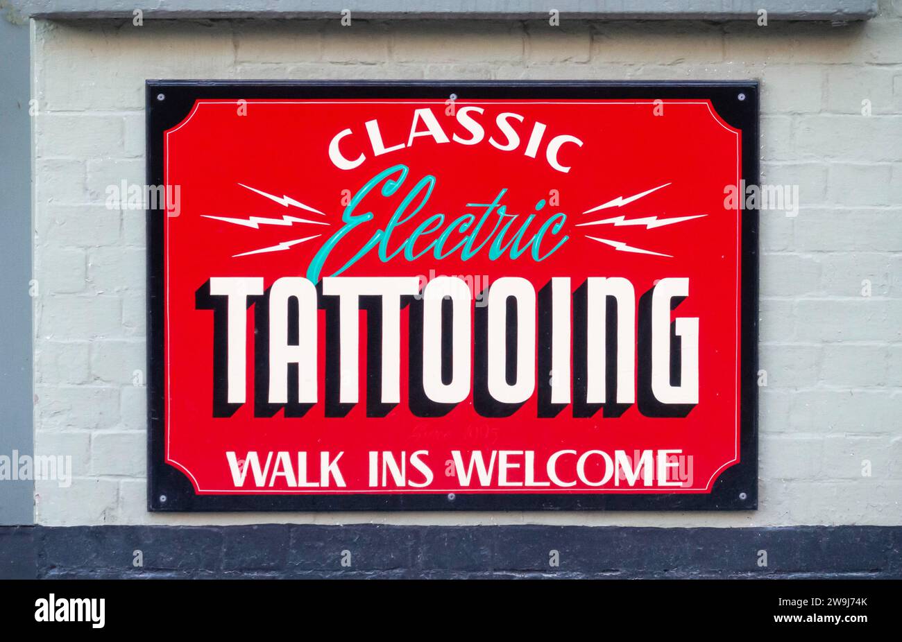 Classic Electric Tattooing sign Stock Photo Alamy