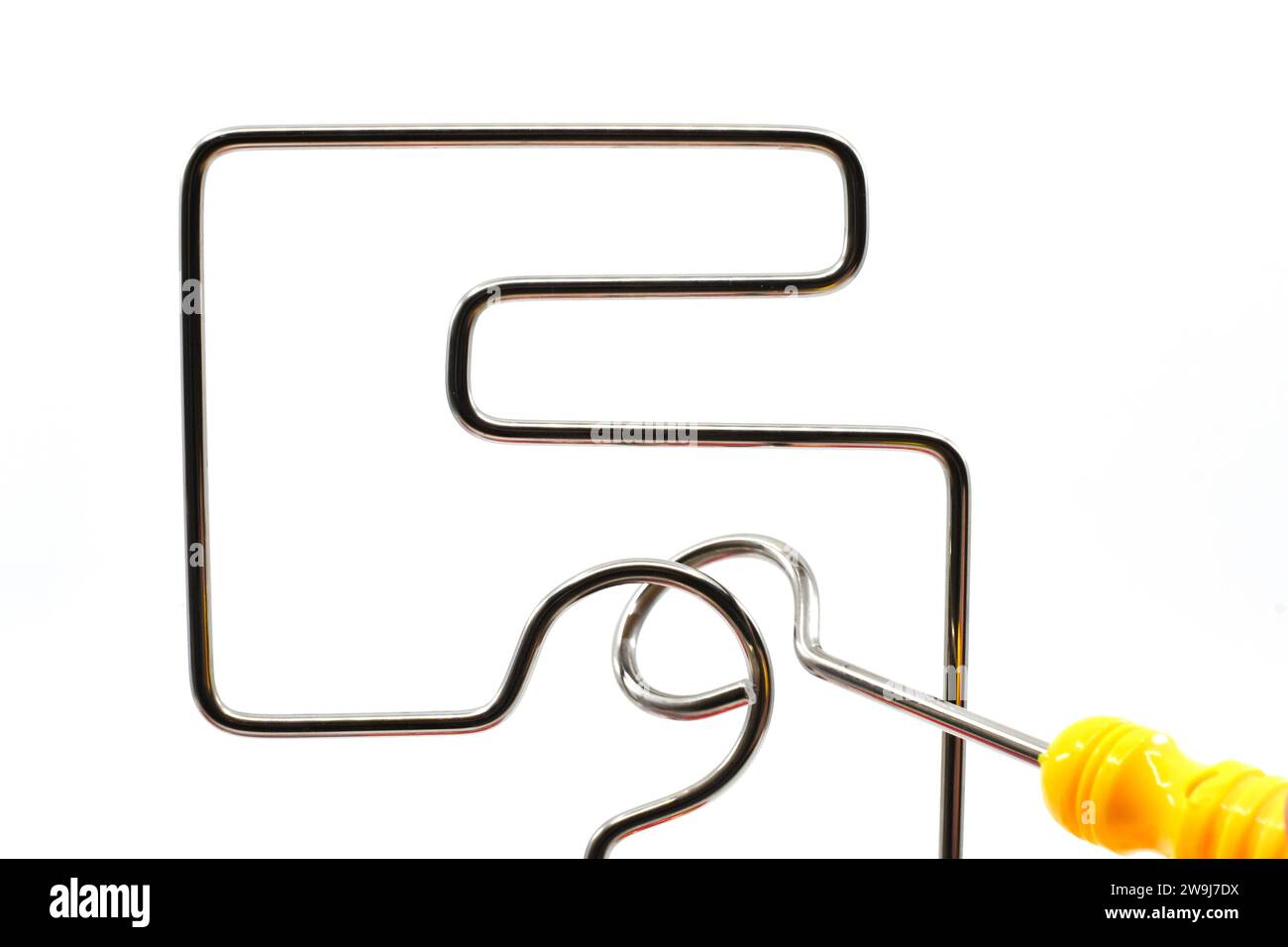 Small wand being moved around a wire frame game without touching the