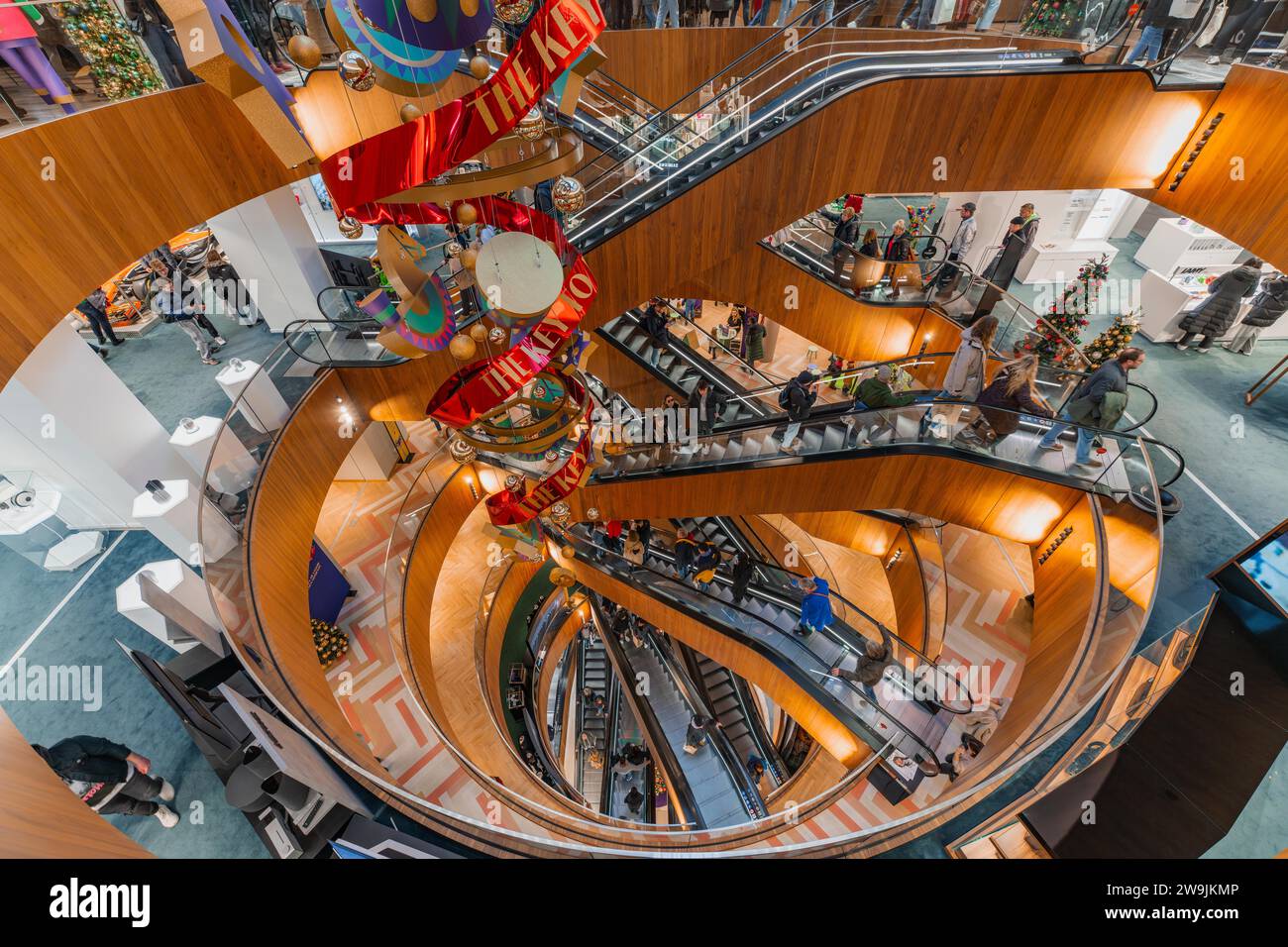 Festively decorated department stores' with several escalators and modern design, KaDeWe, Kaufhaus des Westens, Berlin, Germany Stock Photo