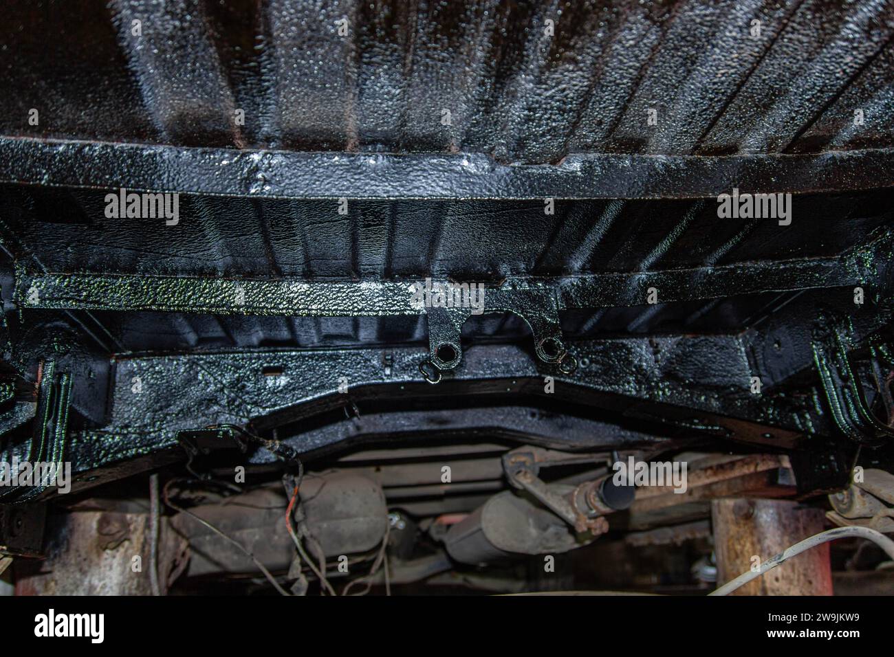 Treated underside of the car with an anticorrosion solution with a