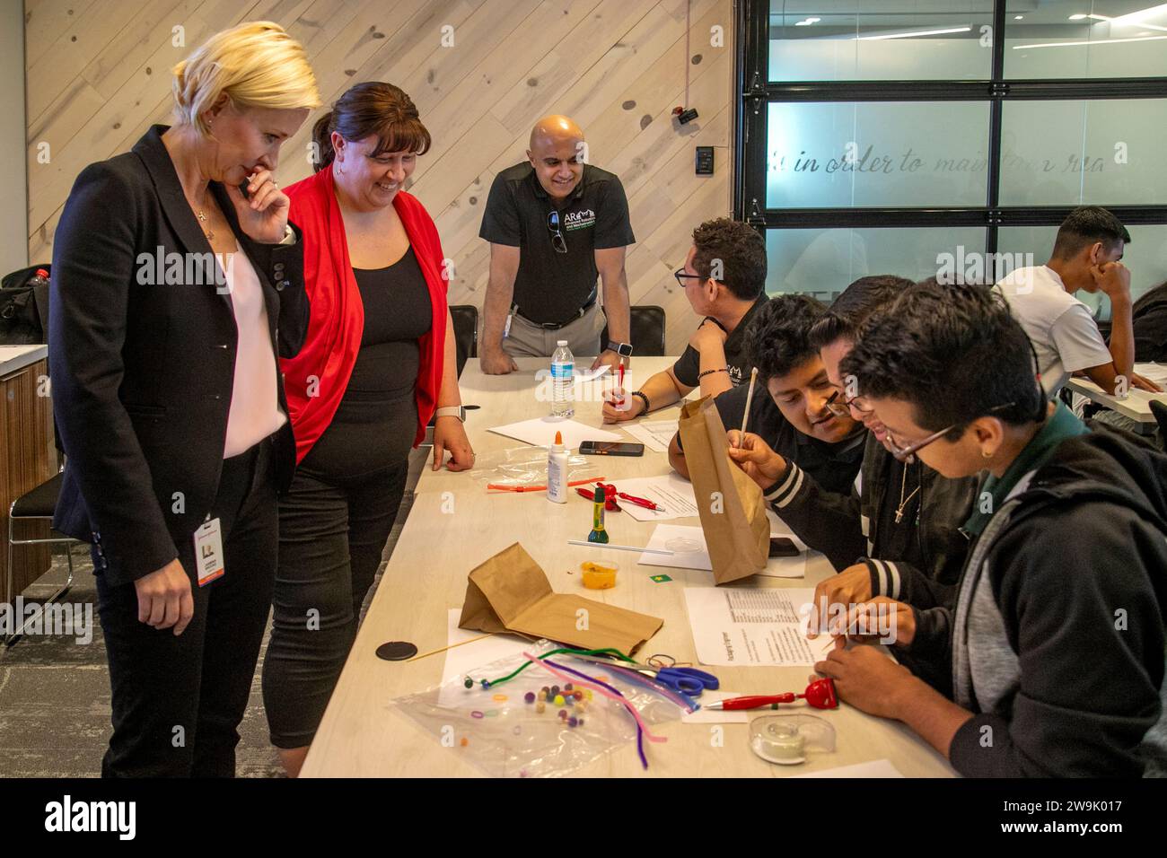 A teacher encourages multiracial college students experimenting with