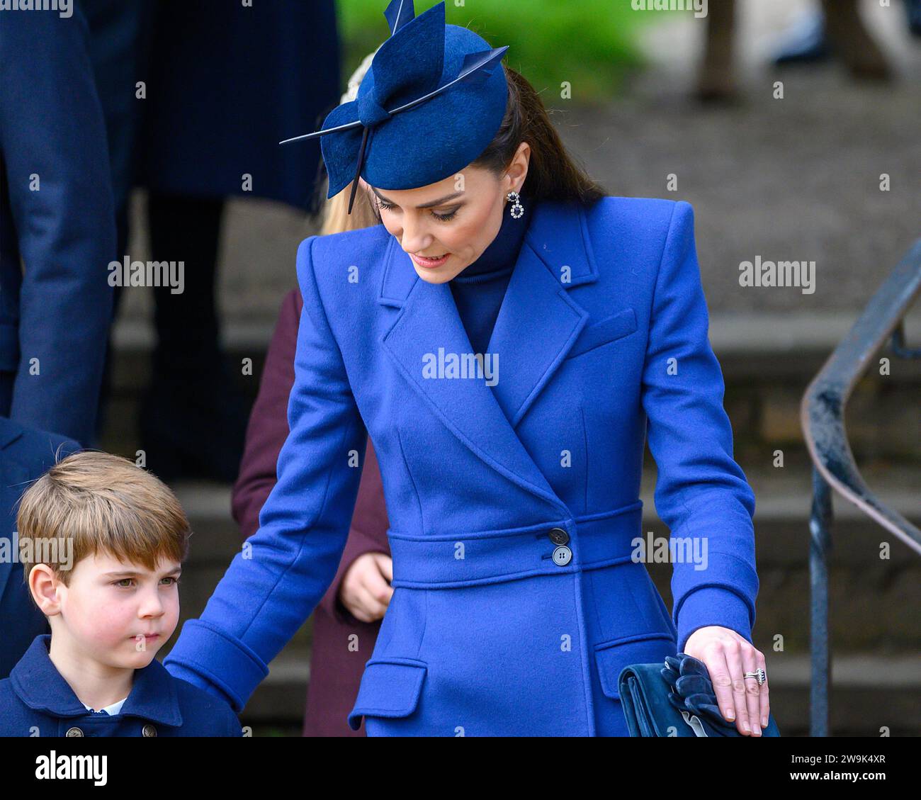 Princess of Wales and Prince Louis greet well-wishers after attending the Christmas service at St Mary Magdalene Church, Sandringham. Dec. 25, 2023 Stock Photo