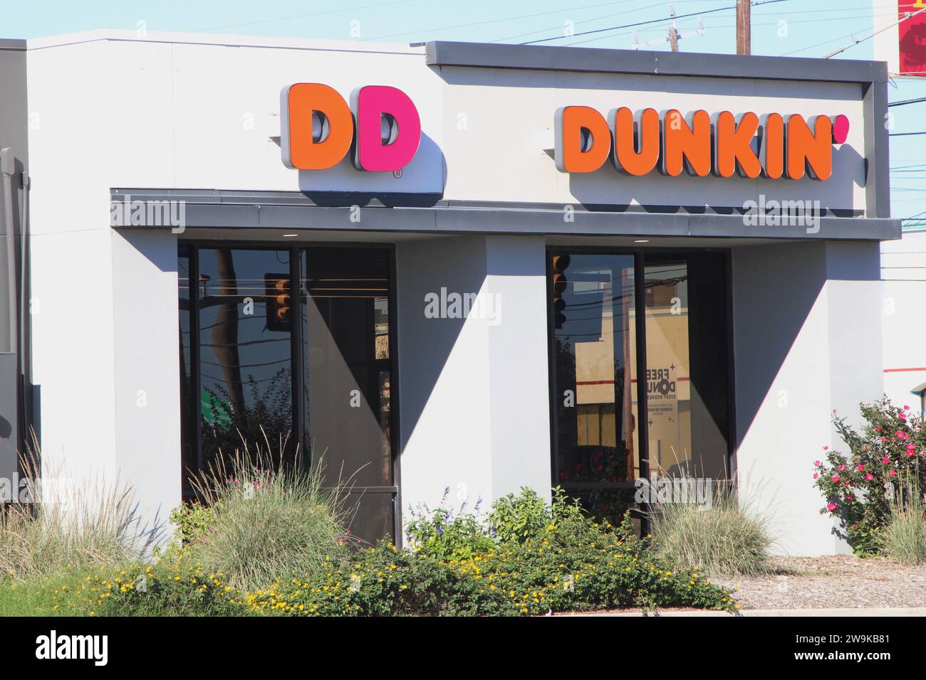 Exterior view and signage of a Dunkin' Donuts location in San Antonio