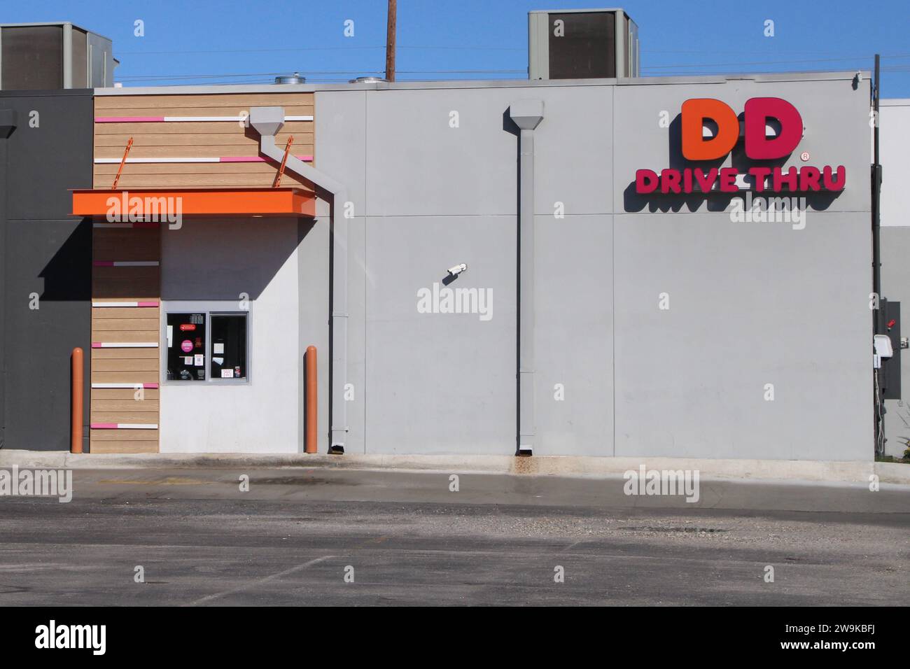 Exterior view and signage of a Dunkin' Donuts location in San Antonio, Texas, USA, on December