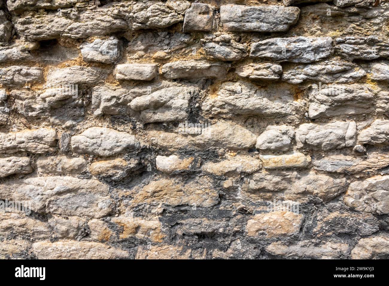 Stone wall background Stock Photo - Alamy