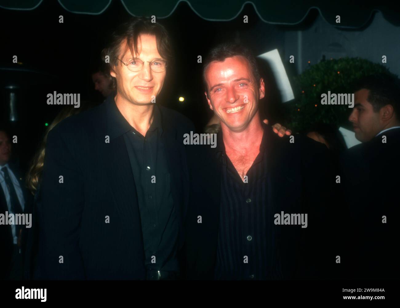 Los Angeles, California, USA 8th October 1996 Actor Liam Neeson and Actor Aidan Quinn attend Warner Bros. ÔMichael CollinsÕ Party at ChasenÕs Restaurant on October 8, 1996 in Los Angeles, California, USA. Photo by Barry King/Alamy Stock Photo Stock Photo