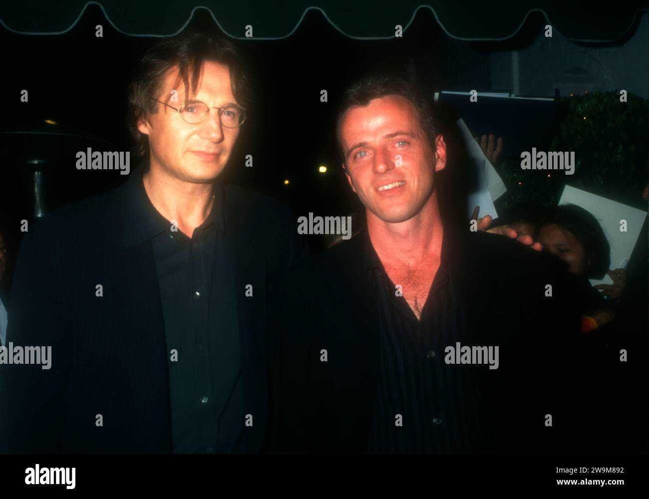 Los Angeles, California, USA 8th October 1996 Actor Liam Neeson and Actor Aidan Quinn attend Warner Bros. ÔMichael CollinsÕ Party at ChasenÕs Restaurant on October 8, 1996 in Los Angeles, California, USA. Photo by Barry King/Alamy Stock Photo Stock Photo