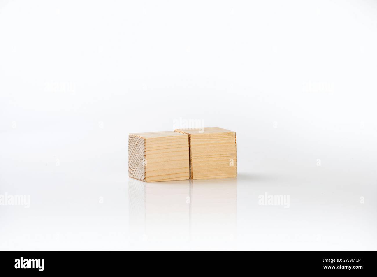 Closeup view of wooden cubes isolated over a white background Stock ...