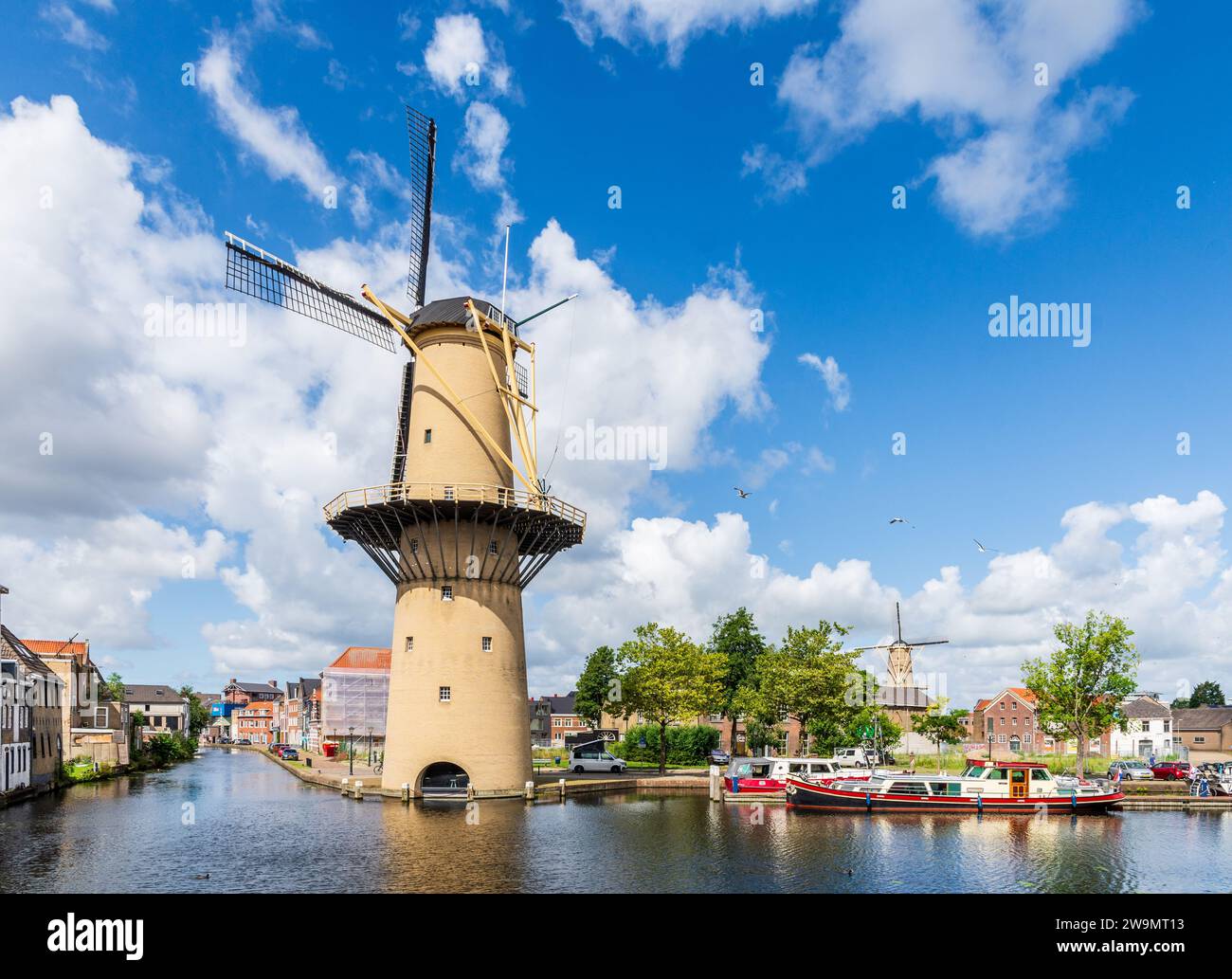 The Schiedam windmills near Rotterdam, Netherlands, are the tallest classic windmills in the world, with the Kameel and the Palmboom windmills. Stock Photo