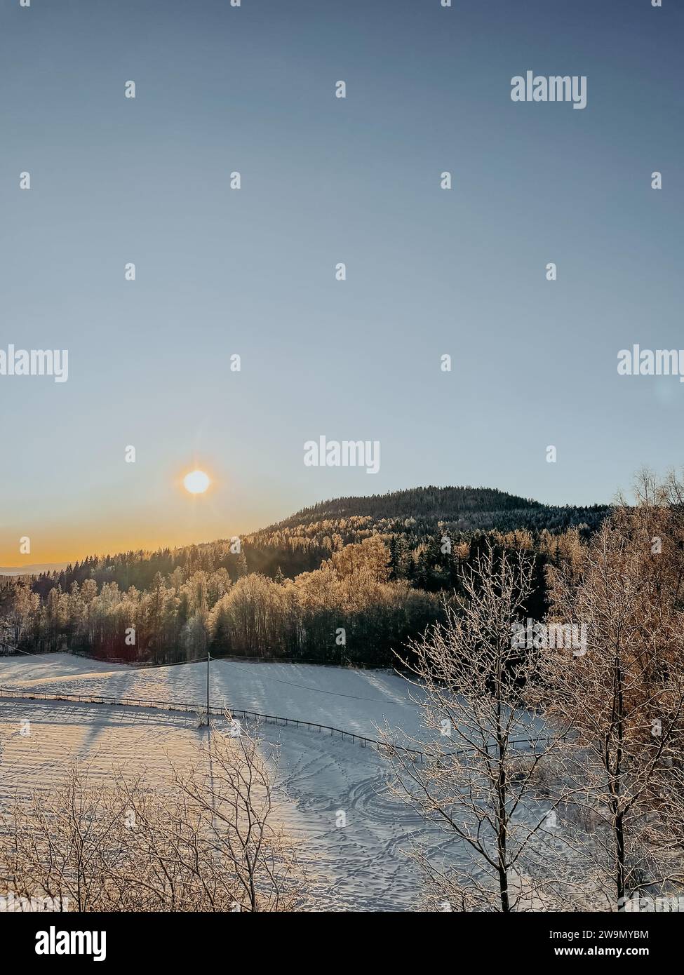 Rural winter landscape at sunset, Baerum, Akershus, Norway Stock Photo