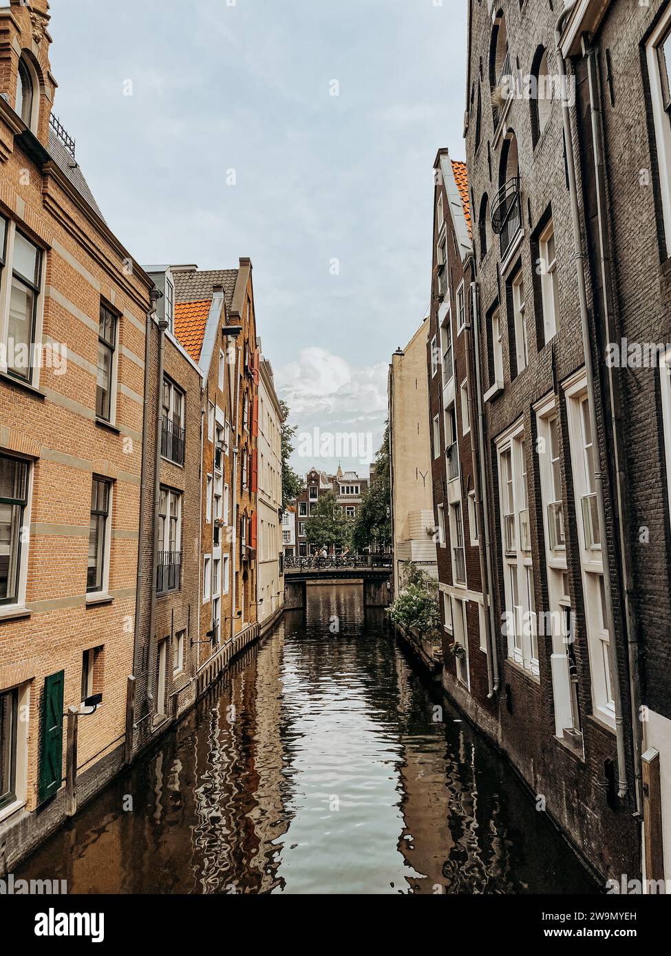 Distant Sluice in a canal, Amsterdam, Netherlands Stock Photo
