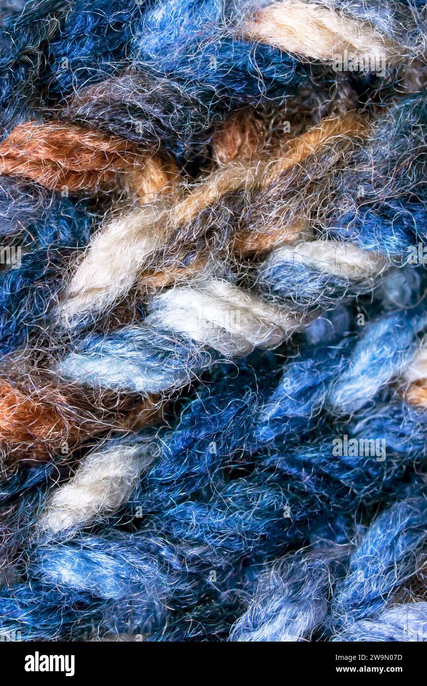 Large loops on blue wool knit fabric, background or texture Stock Photo