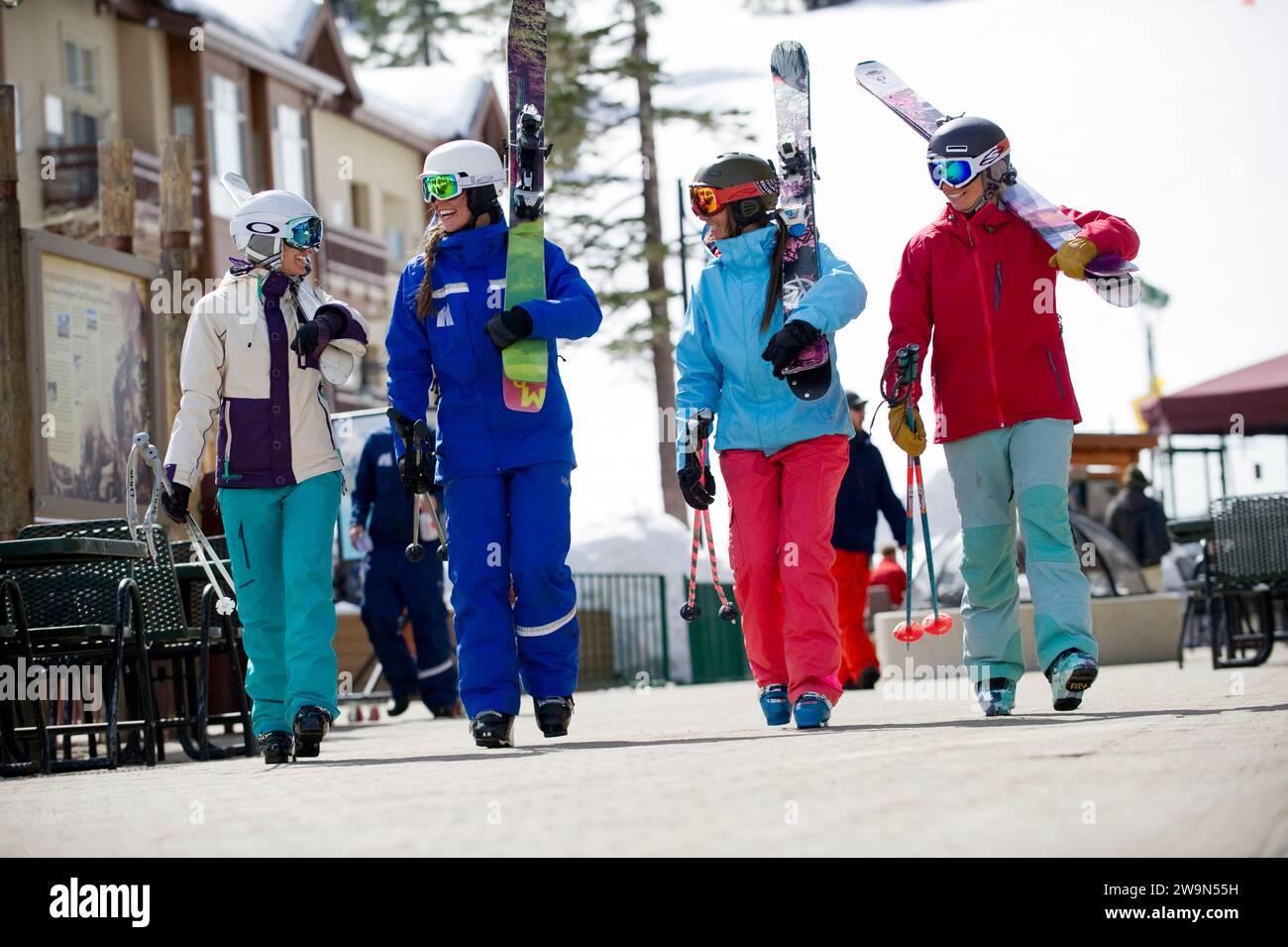 A group of skiers walk with their ski instructor in the village at Kirkwood Mountain Resort in Kirkwood, California. Stock Photo