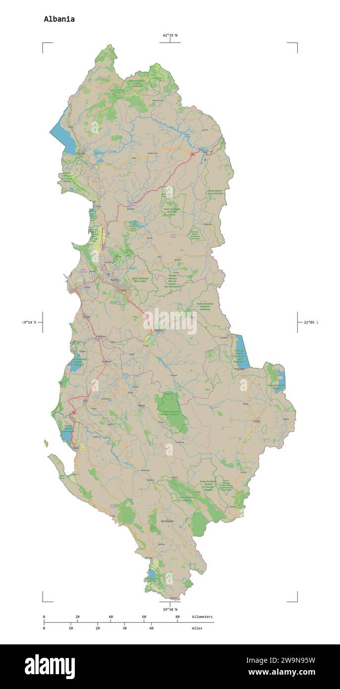 Shape of a topographic, OSM standard style map of the Albania, with distance scale and map border coordinates, isolated on white Stock Photo