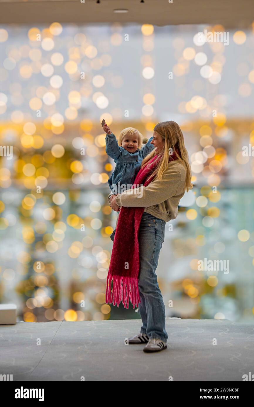 A mother and her daughter at Christmas time Stock Photo