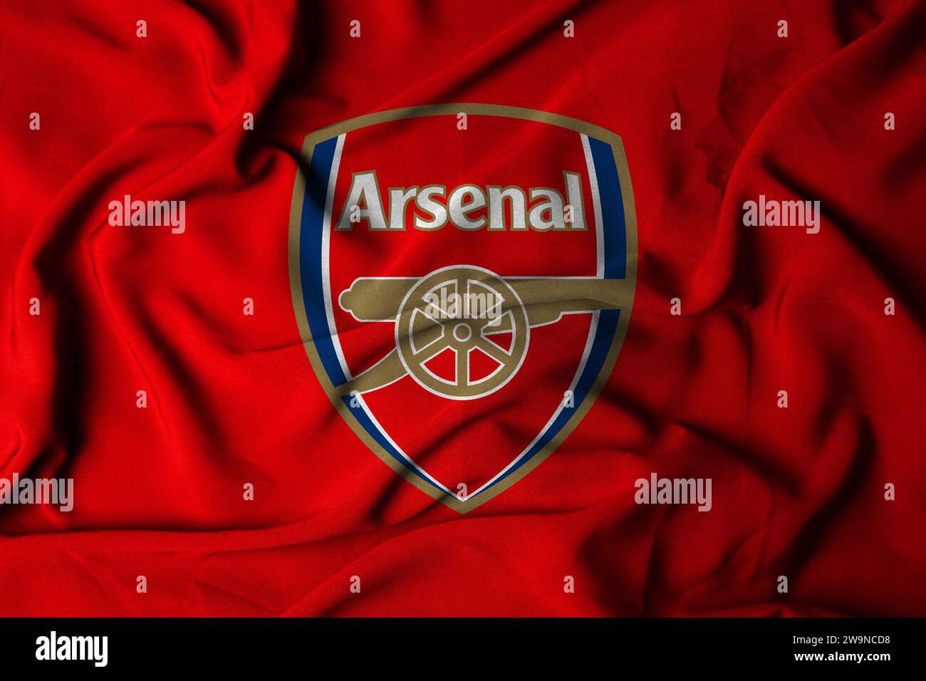 selective focus of Arsenal logo. England london holloway football club with flowing fabric texture. 3D illustration Stock Photo