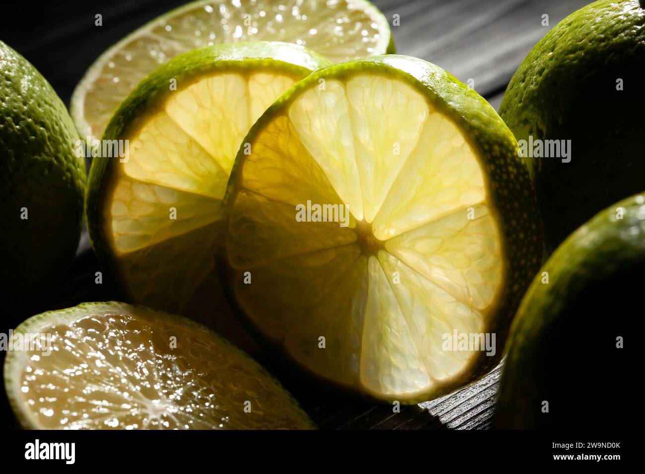 limes closeup on black background Stock Photo
