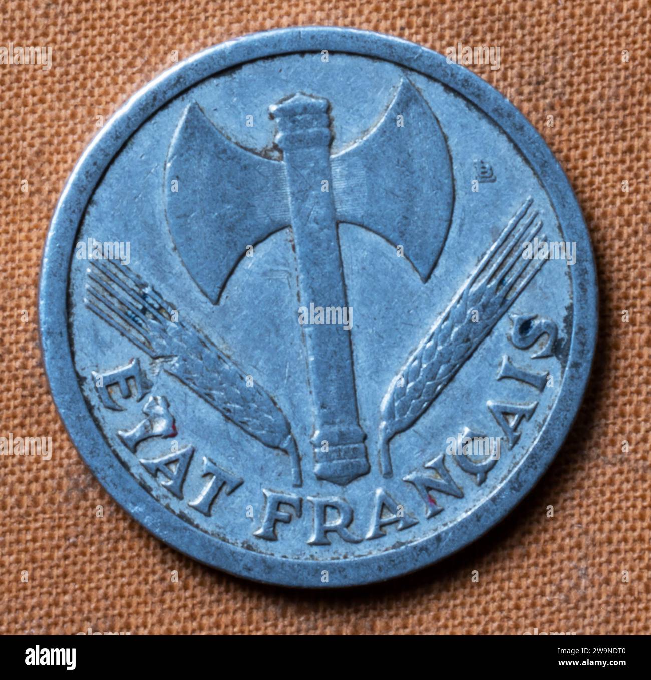 Coin minted at the Monnaie de France during the Vichy rule of France 1942-44; inscription Travail Famille Patrie and Etat Francais Stock Photo
