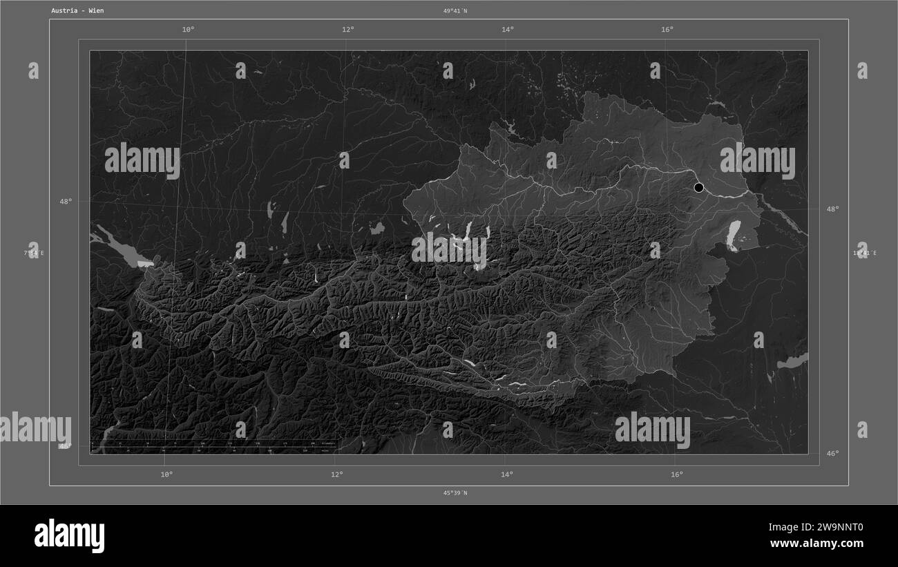 Austria highlighted on a Grayscale elevation map with lakes and rivers map with the country's capital point, cartographic grid, distance scale and map Stock Photo