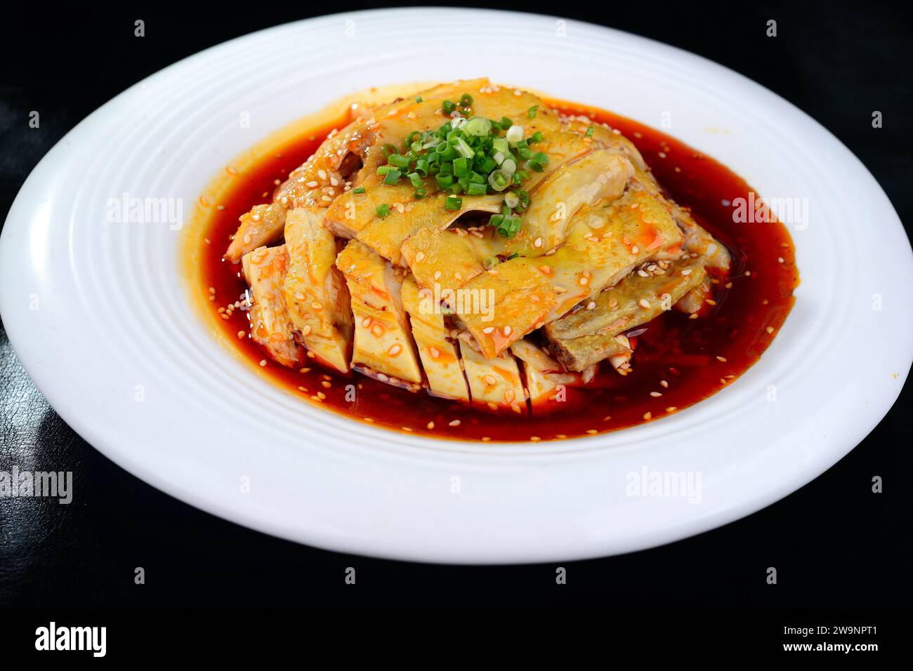 Steamed Chicken in Chili Oil，Mouth-watering chicken (Kou Shui Ji） Stock Photo