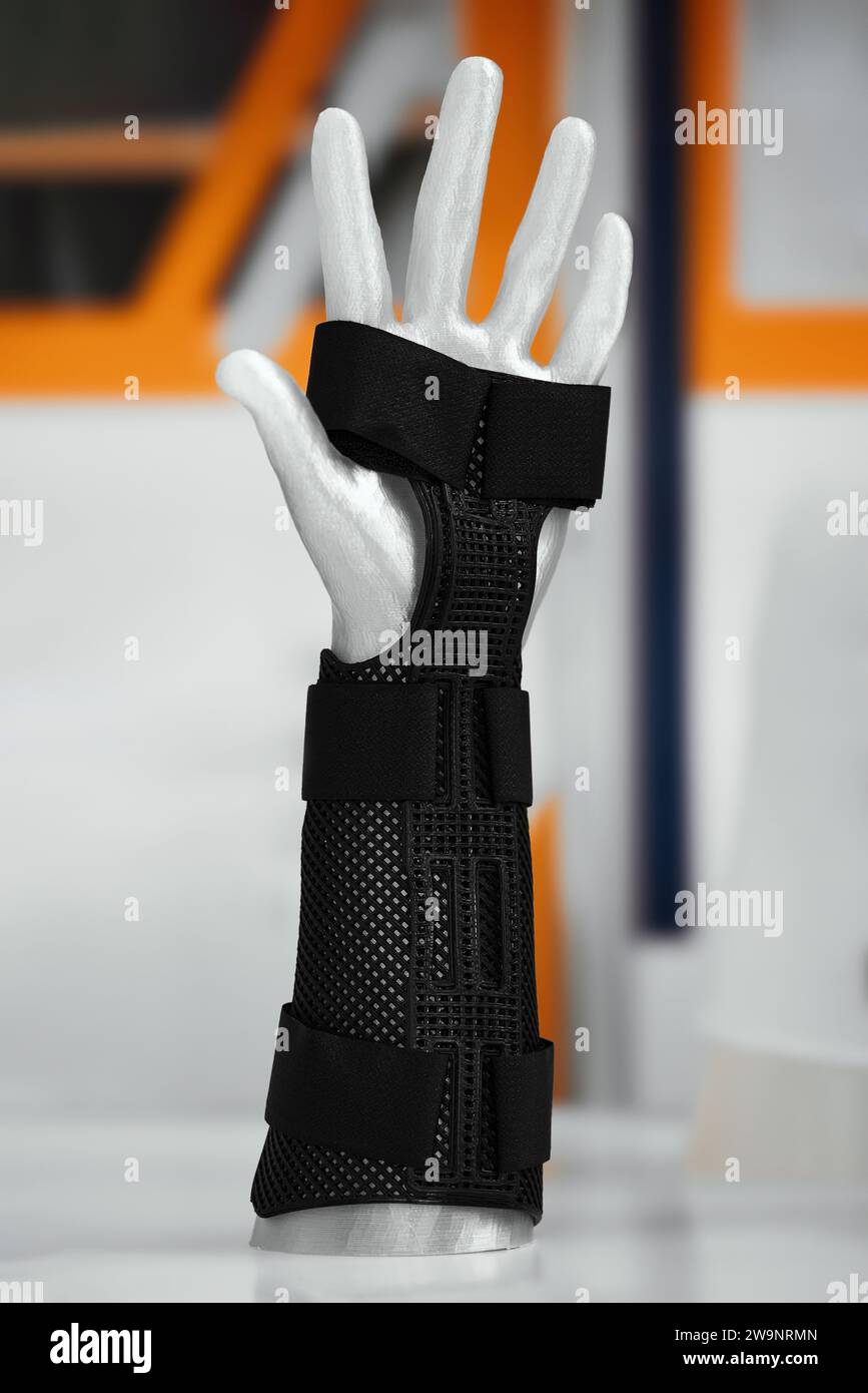 Close up of hand in comfortable adjustable black immobilizer