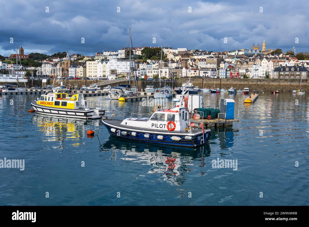 Boats moored in St Peter Port harbour, St Peter Port, Guernsey, Channel Islands Stock Photo