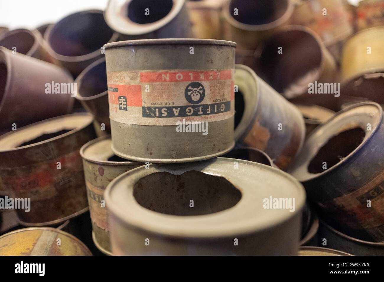 Used gas canisters on display at Auschwitz Stock Photo