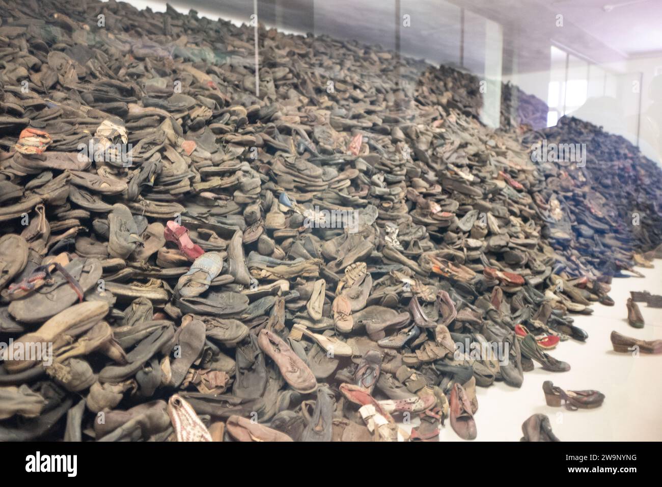 Shoes stolen from prisoners at Auschwitz and Birkenau concentration camps for reuse or sale to German citizens Stock Photo