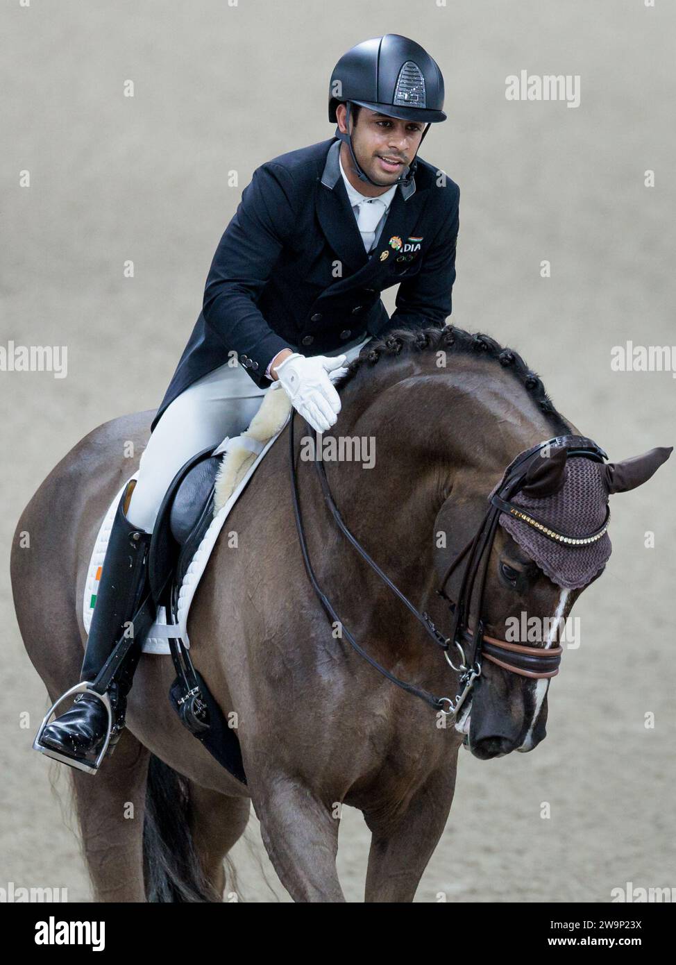 Anush Agarwalla of India with Sir Caramello OLD during the FEI Dressage