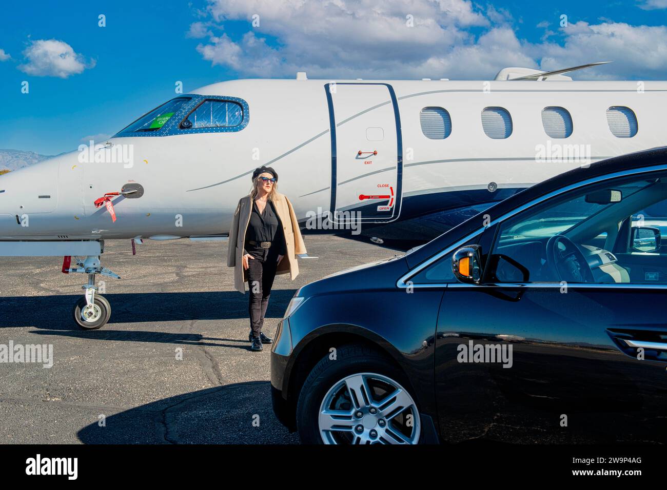 First World problem - VIP person waits outside a locked private jet as the Pilot is late. Stock Photo
