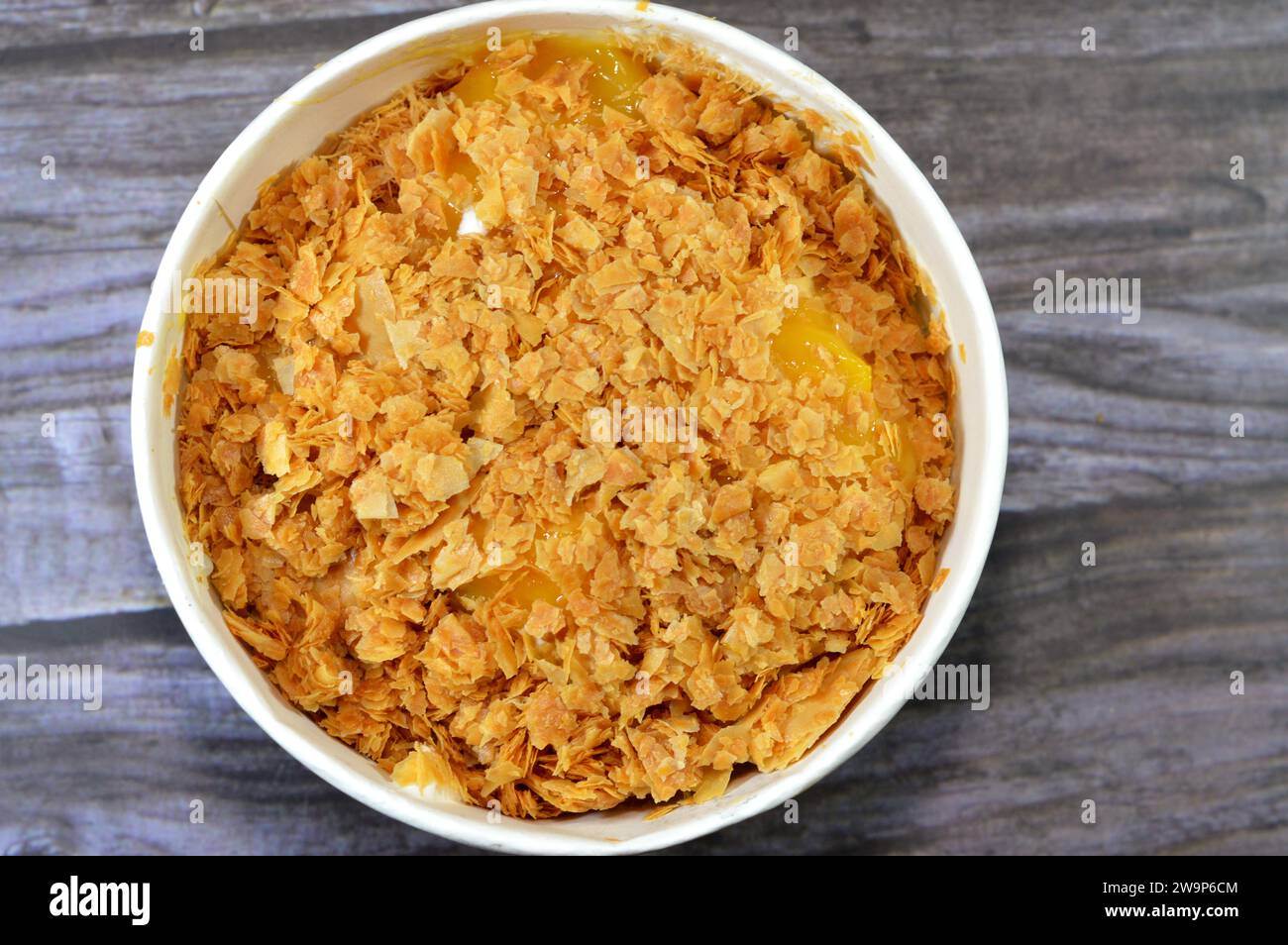 Mango pieces fillings inside Sweet Koshary recipe in Egypt made of