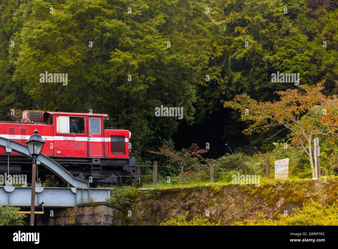 Alishan, Taiwan - October 08 2023 : Red Vintage Train inside Alishan National Forest Park Stock Photo