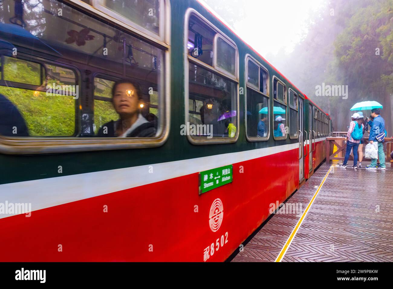Alishan, Taiwan - October 08 2023 : Red Vintage Train inside Alishan National Forest Park Stock Photo