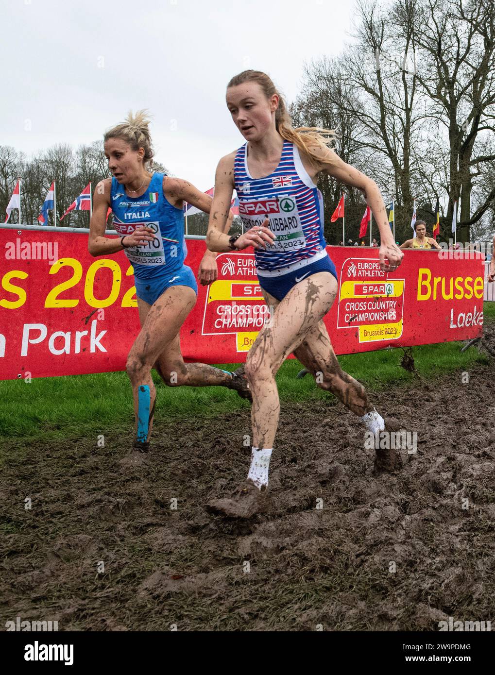 Valentina Gemetto of Italy and Niamh Bridson-Hubbard  of Great Britain & NI competing in the senior women’s race at the SPAR European Cross Country Ch Stock Photo